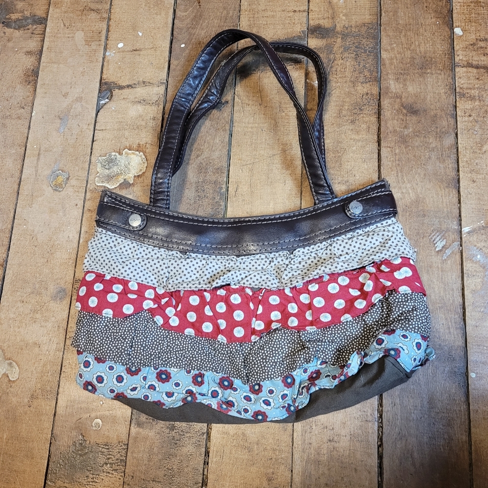 Vibrant Multi-Patterned Shoulder Bag with Leather Handles